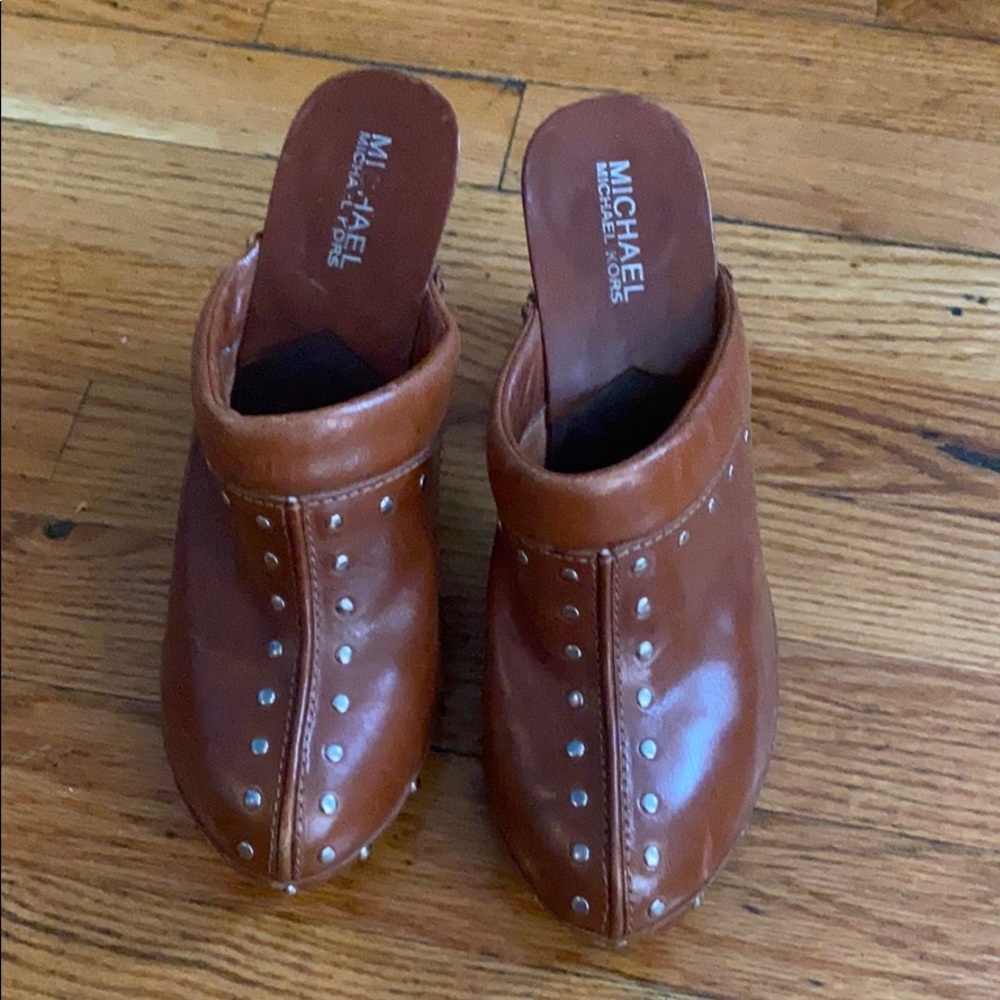 I’m selling a pair of clogs by Michael Kors.